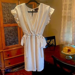 Beautiful cream Casual short dress with bowties